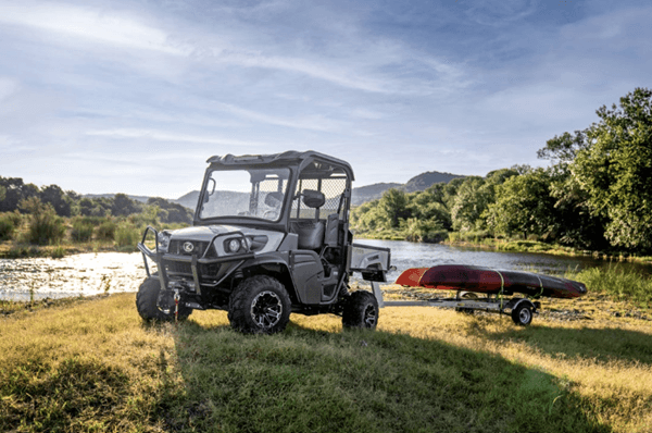 Kubota RTV with a trailer hitched to the rear
