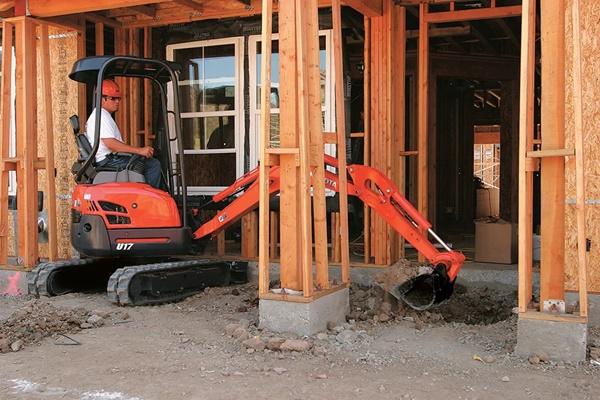 Mini Excavator working on residential site 