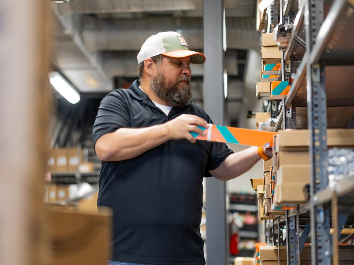 Kubota employee stocking new parts