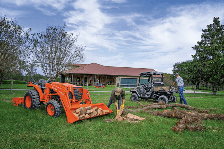 People using a tractor and RTV to help with yard work