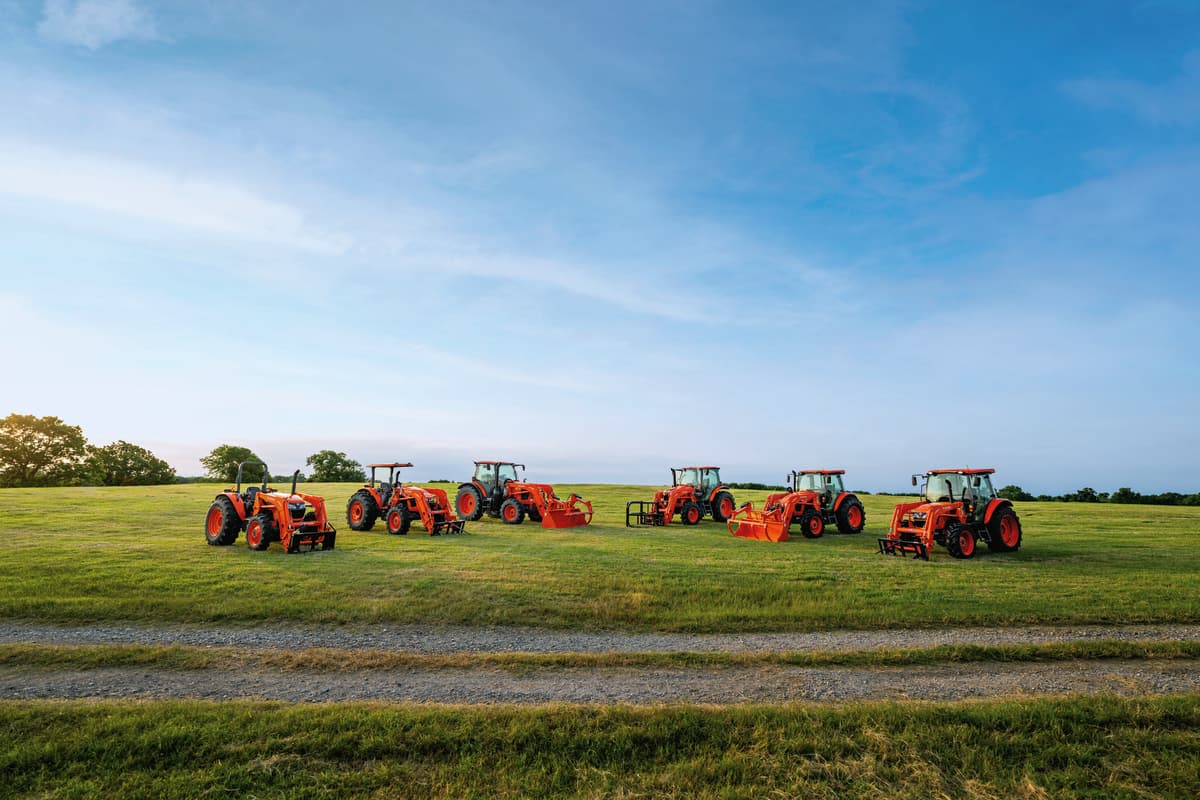 Lineup of tractors on a field