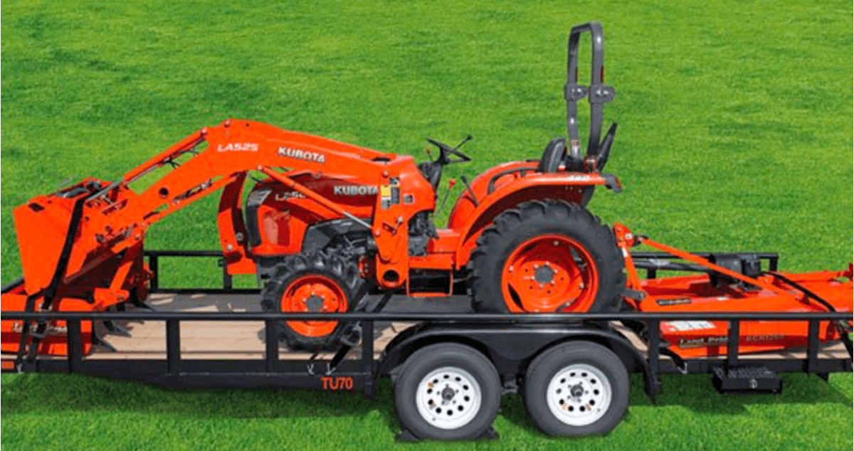 Kubota tractor on the back of a trailer